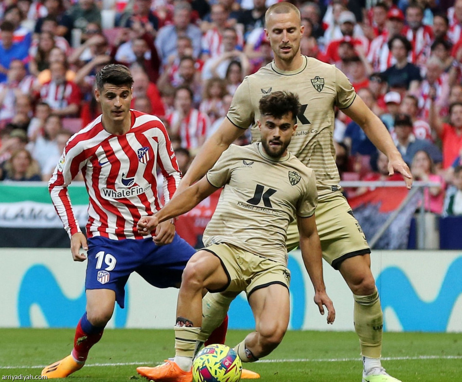 أتلتيكو يعبر ألميريا بثنائية جريزمان